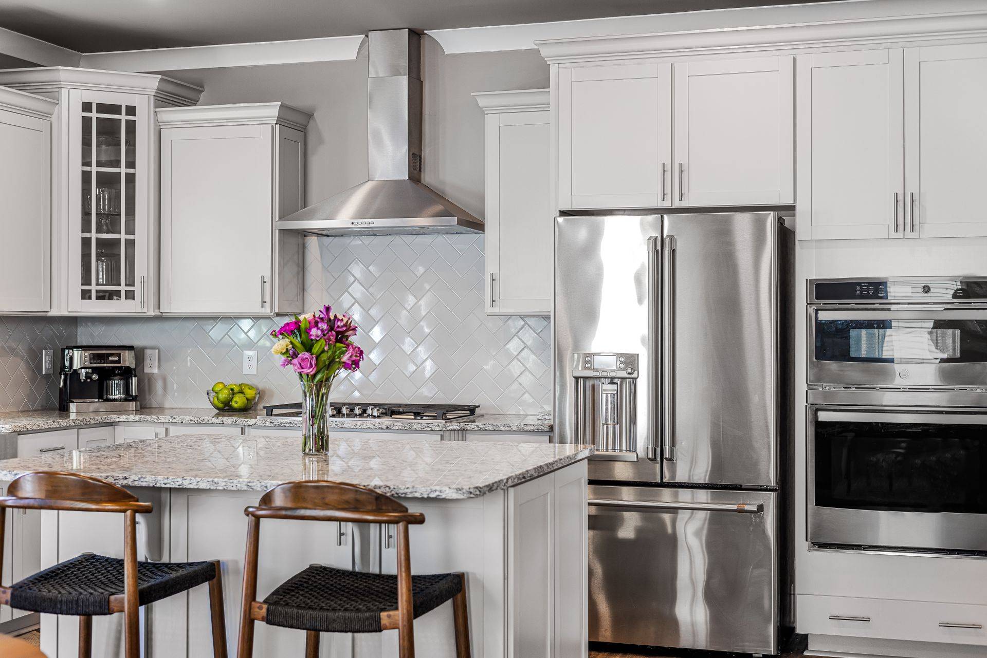 Kitchen with a stainless French door refrigerator